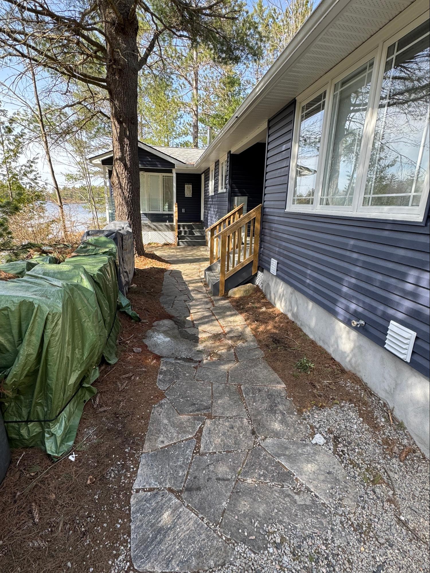 Flagstone walkway to lakeside cottage