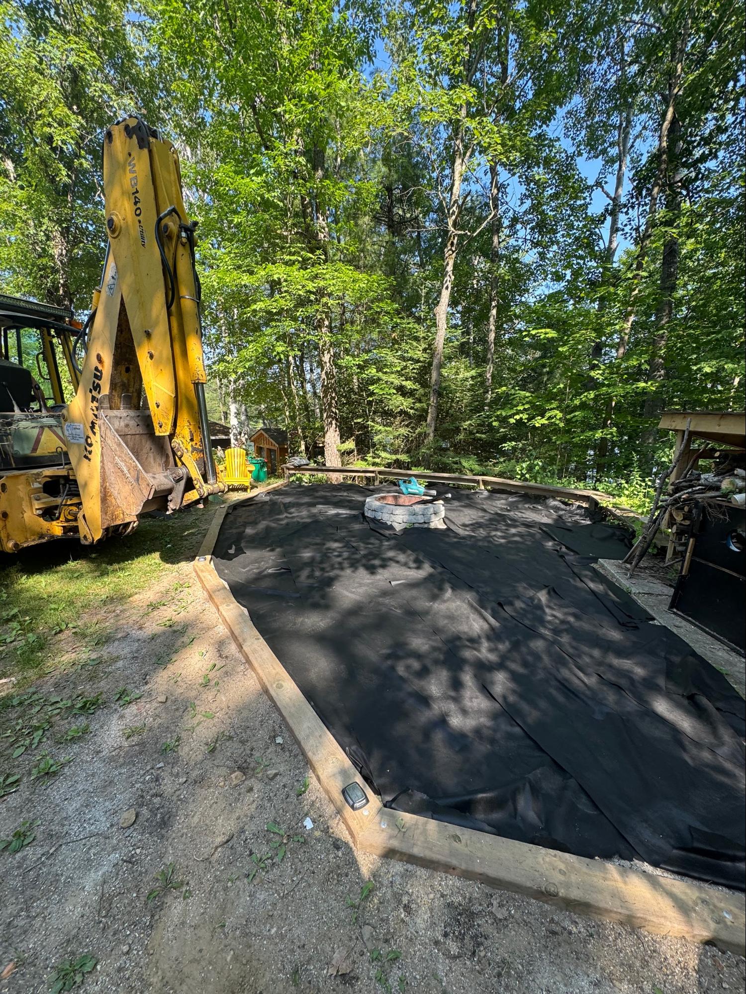 Fire pit area prep with landscape fabric