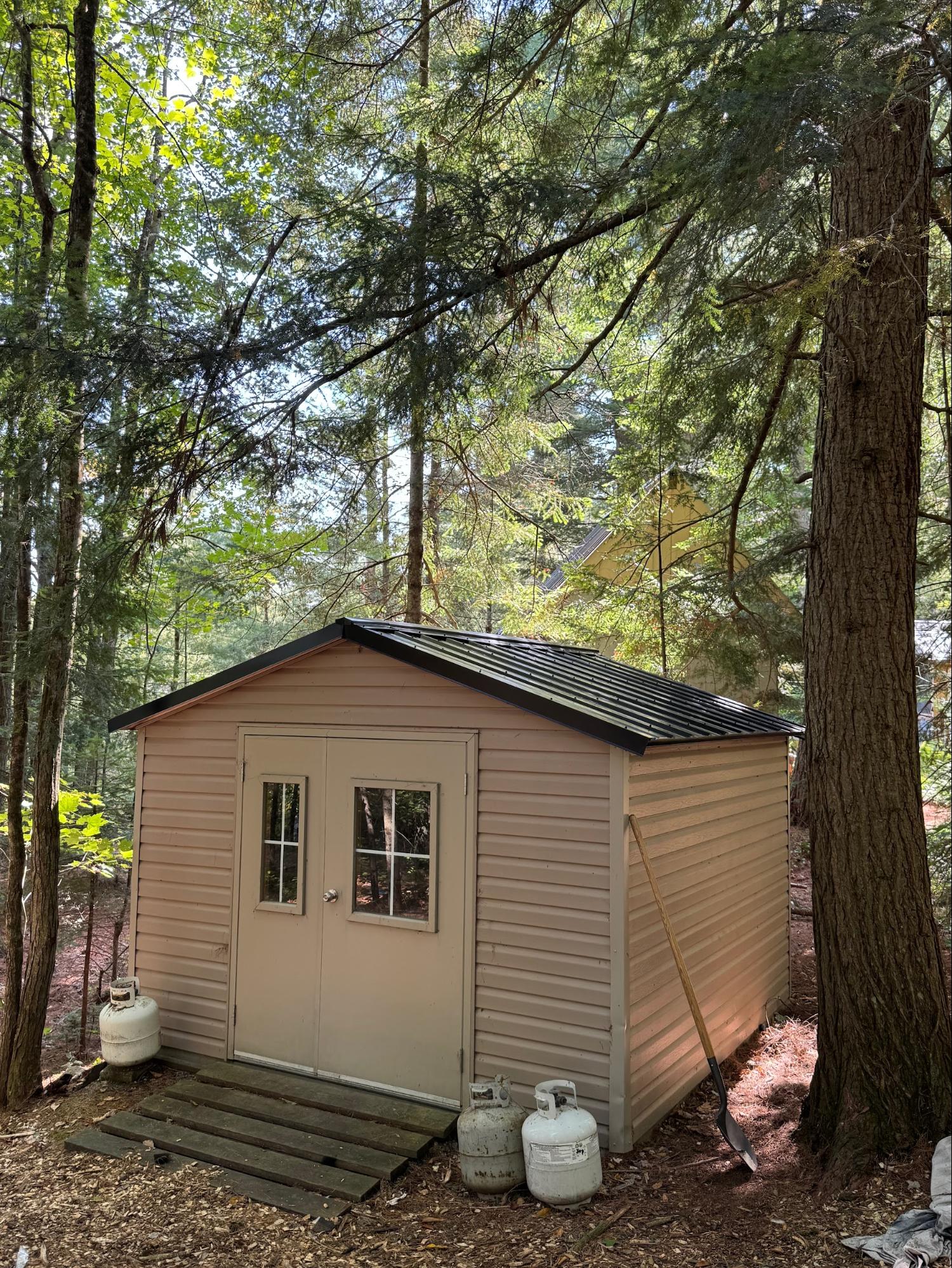 Shed with new metal roof