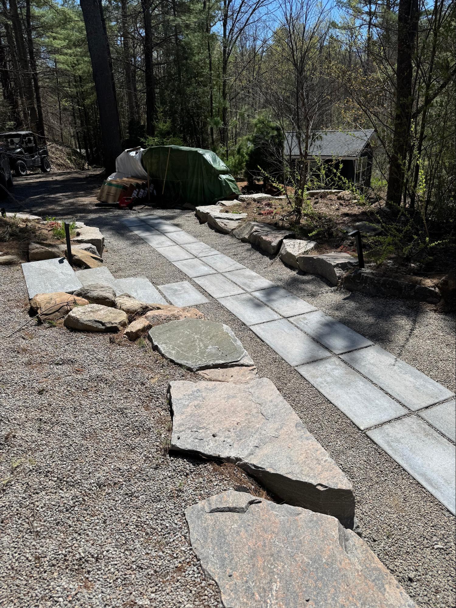 Stone paver walkway with granite stepping stones